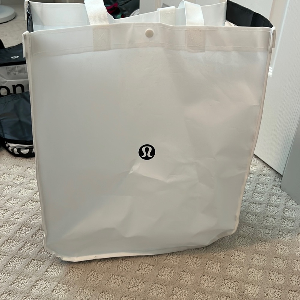 White and black large lululemon bag